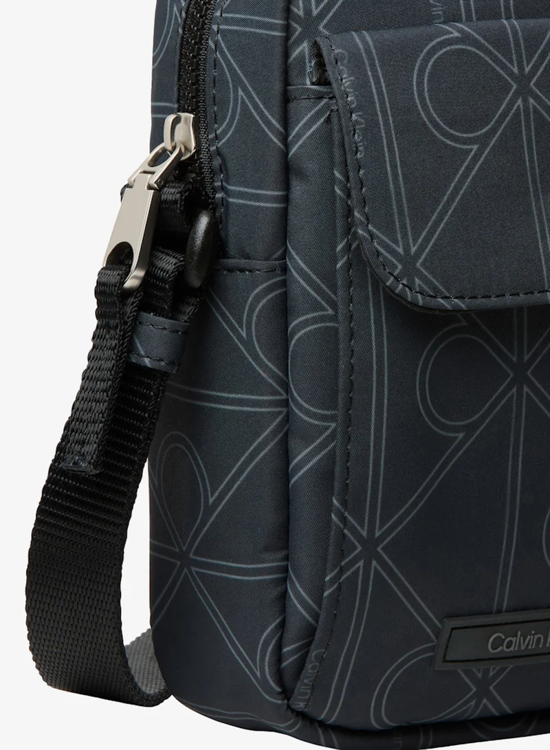 Calvin Klein  all over print messenger bag for Men | Best Price UAE